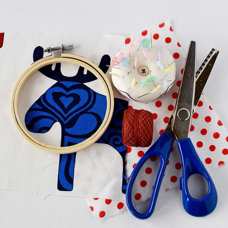 Premium Photo  Hobby and colorful felt crafts workspace view sheets and  crafts made of felt scissors threads and a needle for needlework